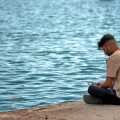 评测团队成员阿橙的头像照片，短发笑容自然，休闲装扮